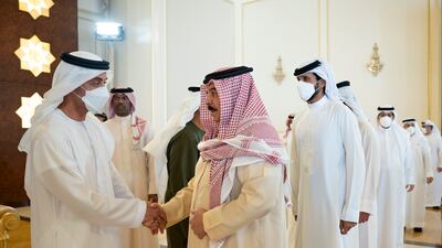 King Hamad of Bahrain, front right, and Sheikh Nasser bin Hamad, fifth from left, speak with Sheikh Hazza bin Zayed, Vice Chairman of Abu Dhabi Executive Council, left. Abdulla Al Neyadi for the Ministry of Presidential Affairs