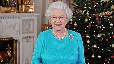 Queen Elizabeth II records her Christmas Day broadcast to the Commonwealth in the White Drawing Room at Buckingham Palace.