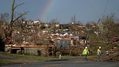A rainbow shines after the tornado in Arkansas. AFP