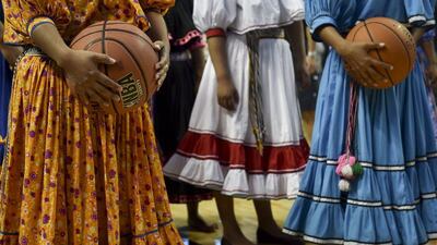 Members of the Tarahumara women's basketball team take part in a clinic with NBA players in Mexico City on Tuesday. Yuri Cortez / AFP