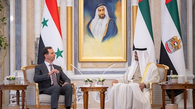 Sheikh Mohamed speaks with Mr Al Assad. Presidential Court
