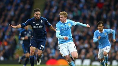 Kevin de Bruyne of Manchester City is closed down by Daniel Carvajal of Real Madrid. Paul Gilham / Getty Images