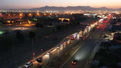 Vehicles wait to cross the US-Mexico border and enter Ciudad Juarez, amid surging Covid-19 cases in the Mexican border city and the US border city of El Paso, Texas. AFP