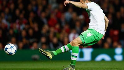 Daniel Caligiuri of Wolfsburg scores their first goal against Manchester United on Wednesday night in the Champions League. Dean Mouhtaropoulos / Getty Images