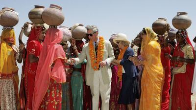 Camilla, Duchess of Cornwall, and Prince Charles visit Artiya village in Delhi, India, in 2006.