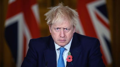 Britain's Prime Minister Boris Johnson delivers a statement on the current coronavirus statistics and testing and lockdown measures during a virtual press conference inside 10 Downing Street in central London. AFP