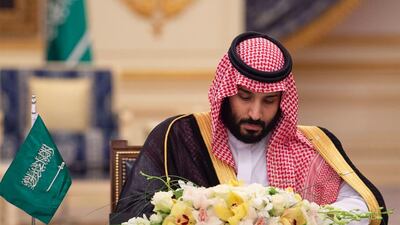 Saudi Crown Prince Mohammed bin Salman signs a MOU during the Saudi-Emirati Council in Jeddah. Photo Courtesy SPA