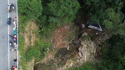 The aftermath of a bus crash in Remedios, Colombia in which more than a dozen schoolchildren and the driver were killed. AFP