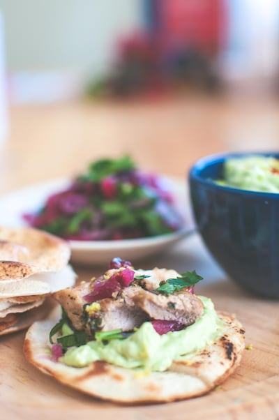 Coriander-yogurt chicken tacos with avocado cream and pickled slaw. Courtesy Scott Price