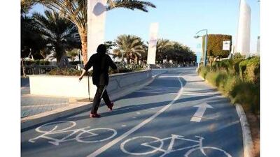 The bike lane on the corniche being crowded with pedestrians. Fatima Al Marzooqi/The National