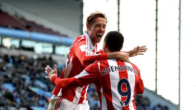 Peter Odemwingie, right, and Peter Crouch both scored for Sroke City on Sunday. Michael Regan / Getty Images