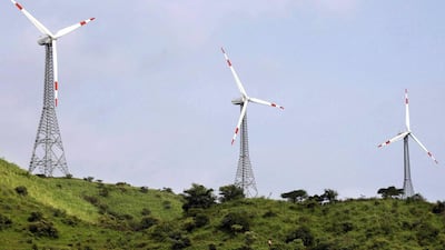 Power-generating windmill turbines are pictured in Suzlon wind farm at Sanodar village, 160 km (99 miles) west of the western Indian city of Ahmedabad. Amit Dave / Reuters