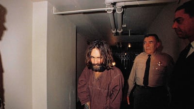 Charles Manson is escorted to court in Los Angeles in 1969. AP Photo