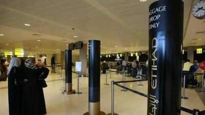 Etihad Airways’ new computer system will enable passengers to complete more of the boarding process before they arrive at the departure gate. Delores Johnson / The National