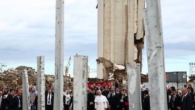 The pontiff holds a silent prayer at the site of the 2020 Beirut port blast. AFP