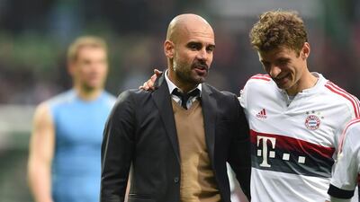 Thomas Muller, right, has urged his Bayern Munich teammates to get back to winning ways this weekend. Carmen Jaspersen / EPA