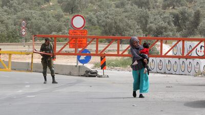 Israeli troops close off the main entrance to Azzun, near the West Bank city of Qalqilya, after Adwan was killed early on Saturday. EPA