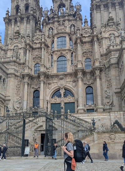 Standing in front of the cathedral in Santiago de Compostela. Hayley Kadrou / The National