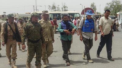 Members of the World Food Programme visit the Red Sea mills warehouse in the Yemeni port city of Hodeidah. AFP