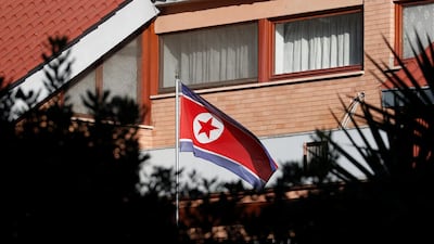 The flag of North Korea flutters in front of its embassy in Rome, Italy. Reuters
