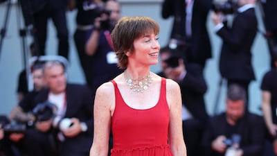 Actress Julianne Nicholson in a red tiered dress. Getty Images