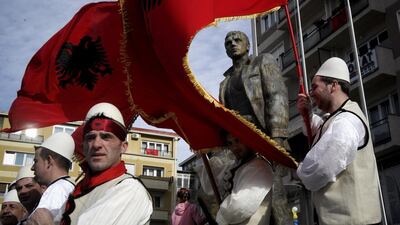 Kosovars wave Albanian flags on February 17, 2014, during celebrations in Pristina, Kosovo, marking the sixth anniversary of the country’s declaration of independence from Serbia. Almost 106 countries have recognised Kosovo since ethnic Albanians proclaimed independence in February 2008, following a 1998-1999 conflict that ended with Nato bombing campaign against Serbian forces. Armend Nimani / AFP photo