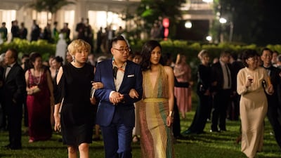 Awkwafina, from left, Nico Santos and Constance Wu in a scene from 'Crazy Rich Asians.' Sanja Bucko / Warner Bros. Entertainment via AP
