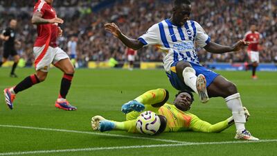 MANCHESTER UNITED RATINGS: Andre Onana - 5/10. His distribution with his feet is still hit and miss. Almost got Martinez in trouble with one pass. Nearly gave away a penalty following some risky play outside his box late on. AFP