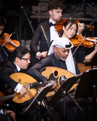 Emirati oud player Abdulaziz Al Madani, second from left, performing as part of the the UAE National Orchestra. Photo: UAE National Orchestra
