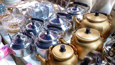 Teapots for sale at Al Mansoori Supply general store on Millions Street at Al Dhafra Festival. Victor Besa / The National