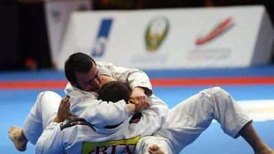Russia’s Umarov Isa and Brazil’s Juliano Di Machado battle during the World Professional Jiu-Jitsu Championship yesterday. Satish Kumar / The National
