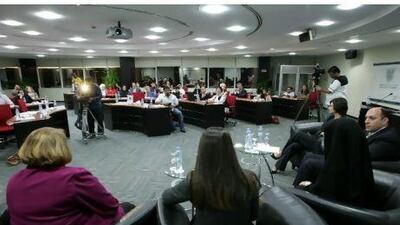 Panelists speak about child abuse at a Dubai School of Government forum.