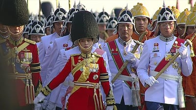 Princess Bajrakitiyabha, centre, takes part in the coronation procession of her father, King Maha Vajiralongkorn, in 2019. AFP