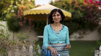 Lubna Sarwar, a semi-retired primary school teacher, at her Flamingo Villa home in Al Sufouh, Dubai, last month. “I want children to look back and say I had a memorable lesson ... that’s the idealist in me.” Christopher Pike / The National