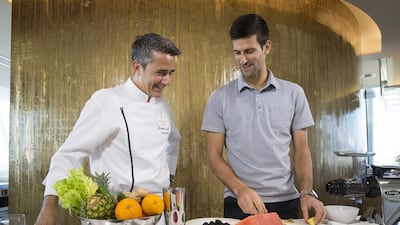 Novak Djokovic with chef Maxime Luvara at Bab Al Yam restaurant at the Burj Al Arab in Dubai. Photo Courtesy / Dubai Duty Free Tennis Championships
