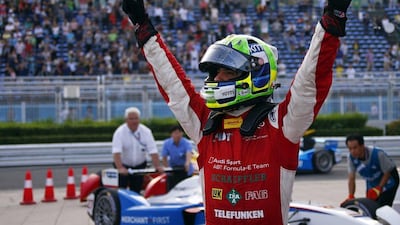 Lucas di Grassi celebrates after he wins the inaugural Formula E electric championship race on Saturday, the Beijing ePrix. Petar Kujundzic / Reuters