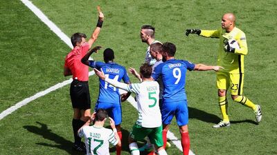 Shane Duffy of Republic of Ireland is shown a red card by referee Nicola Rizzoli. Lars Baron / Getty Images