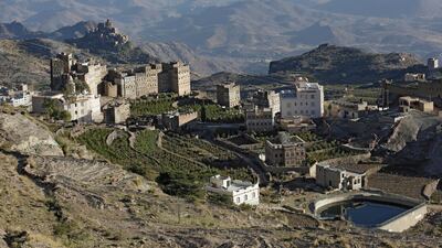 A general view shows buildings surrounding coffee fields at a village in the mountain region of Haraz, Yemen. EPA