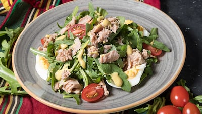 Canned seafood will make an appearance on chic restaurant menus in 2022. Farhad Ibrahimzade / Unsplash