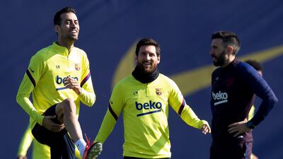 Barcelona's Lionel Messi, centre, during training on Friday. EPA