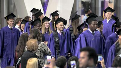 Entrance of graduates of NYU Abu Dhabi. Leslie Pableo for The National