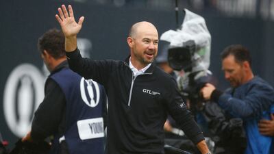 Brian Harman of the US celebrates on the 18th green after winning the 151st Open Championship. Reuters