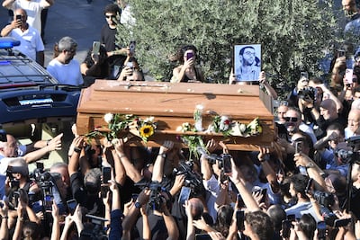 Mourners carry the coffin of Lebanese playwright and musician Ziad Rahbani at his funeral in Bikfaya, Lebanon, on July 28 last year. Getty Images