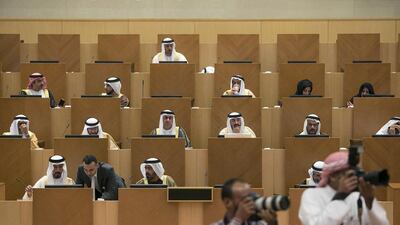 Members of the most recent Federal National Council at their chambers in Abu Dhabi. With elections looming, candidates want better public understanding of the council’s role. Silvia Razgova / The National