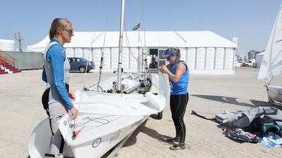 Great Britain’s Saskia Clark and Hannah Mills pack up after winning the women’s 470 Class of the ISAF Sailing World Cupin Abu Dhabi. Jeffrey E Biteng / The National