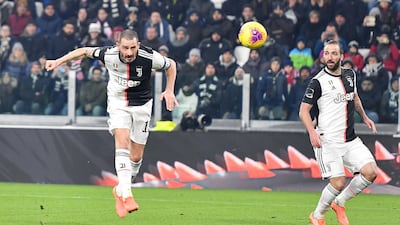Leonardo Bonucci, left, makes it 3-0. EPA