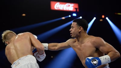 Rolando Romero (blue trunks) and Arturs Ahmetovs (white trunks) box during their lightweight bout at MGM Grand Garden Arena, Las Vegas. Reuters