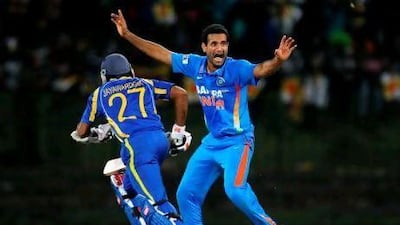 Irfan Pathan, right, sent three of Sri Lanka's top-order batsmen to the pavilion last night. Ishara S Kodikara / AFP
