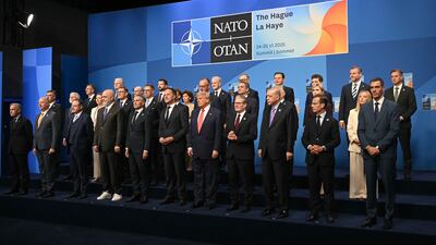Leaders pose for a family photo during the Nato summit in The Hague. AP