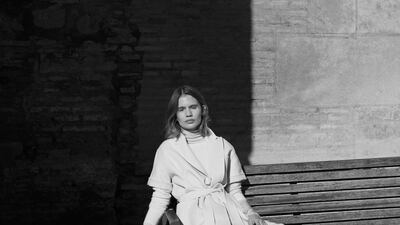 Jumper, Dh1,995; coat, Dh5,800; and skirt, Dh2,290, all from Max Mara. Trainers, Dh2,360, Valentino. Socks, stylist’s own